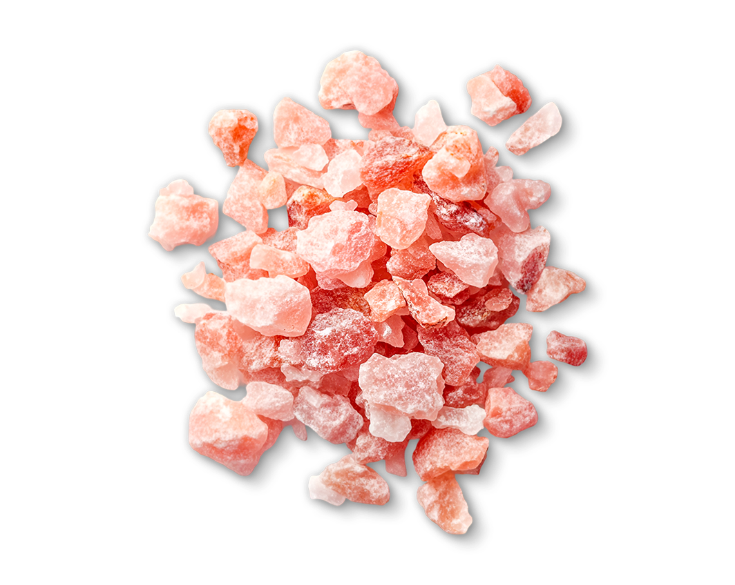 Pink Himalayan salt crystals on a white background